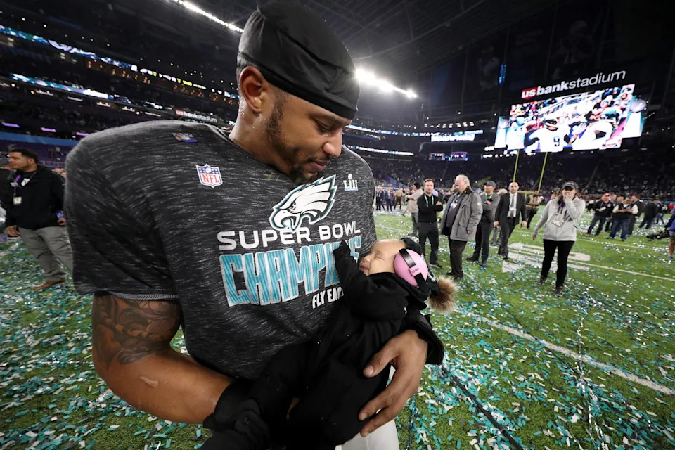 Super Bowl Champ Najee Goode with his daughter